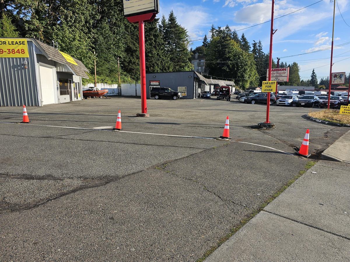 Looking down Auto Row past neighboring dealership lots